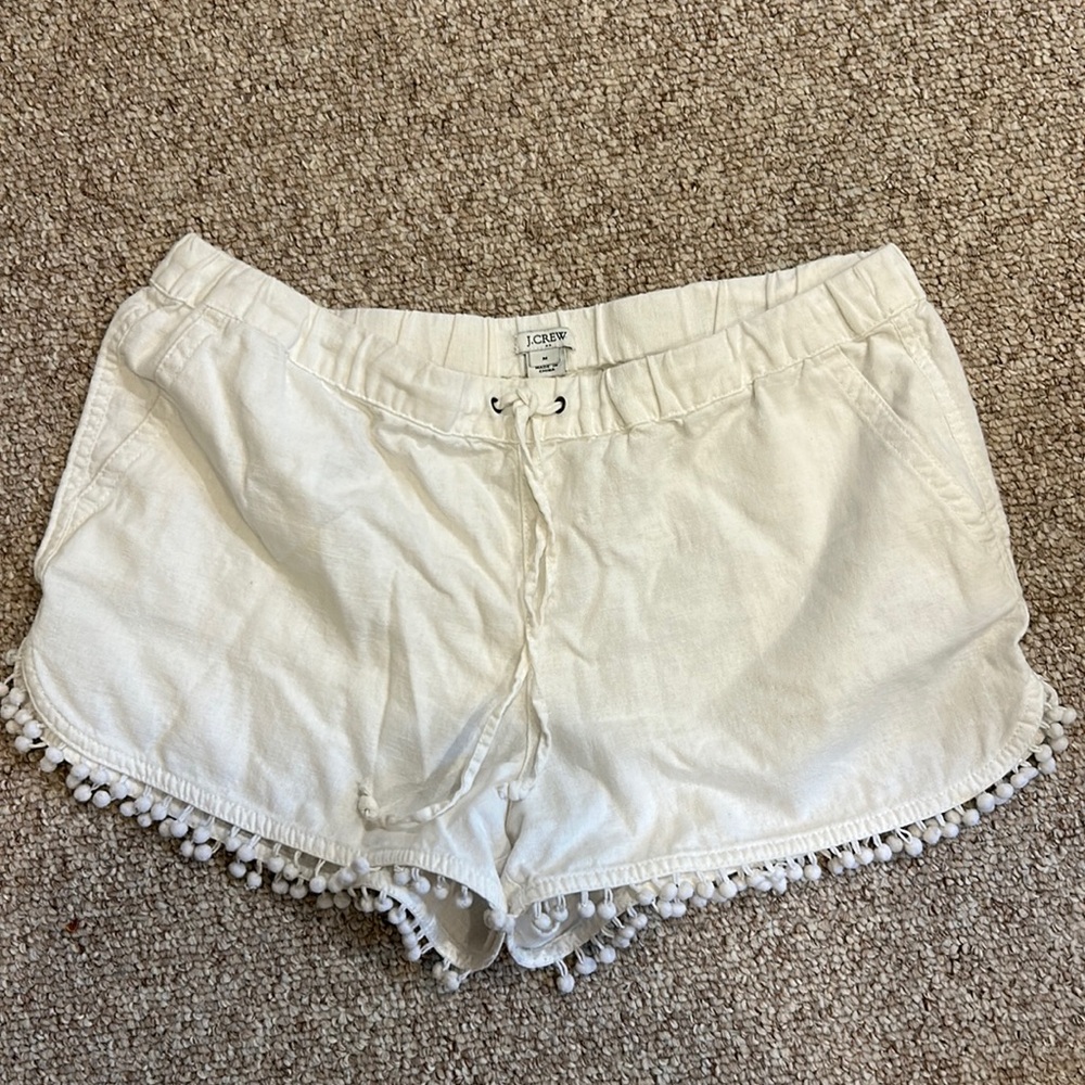 J. Crew white linen drawstring shorts with Pom Pom embellishment detail on hem